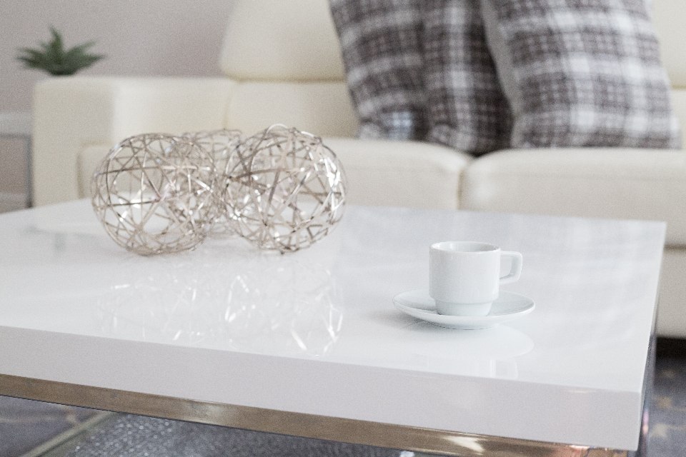 Glassware and cup on a home coffee table